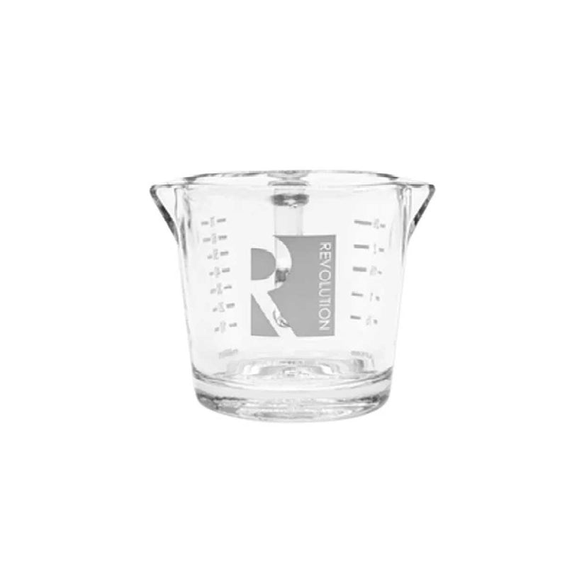 A clear glass measuring cup with side handles and printed measurement markings, featuring a gray logo that reads 'R E V O L U T I O N' on the front, set against a plain white background.